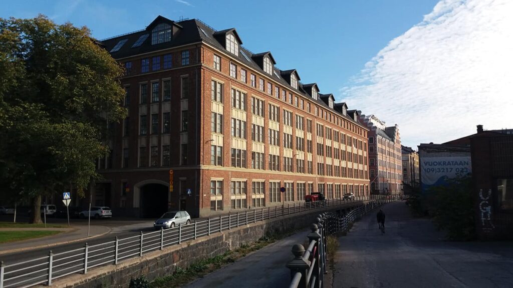 three group of gold coins on top of the newspaper showing statistics on them.