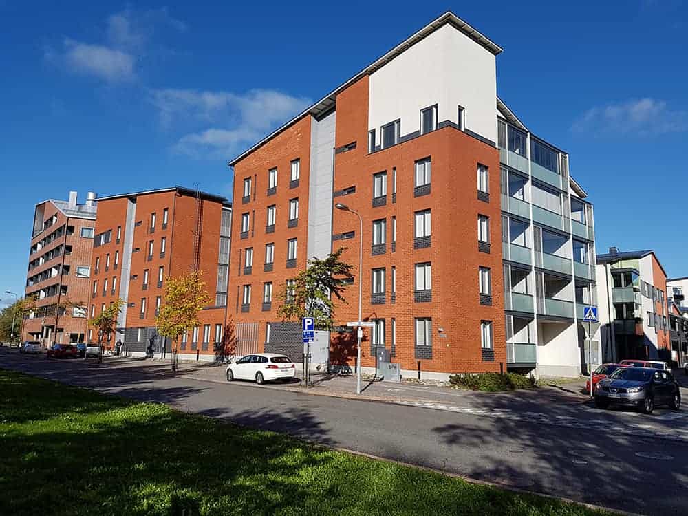 three group of gold coins on top of the newspaper showing statistics on them.